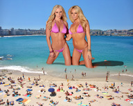 giantess collage city blonde swimsuit beach multiple_giantesses cleavage water buildings wonderslug kneeling sand giantesses bay looking_at_viewer sunbathers beach_goer