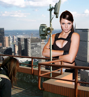 giantess collage city cleavage wonderslug skyscrapers sky looking_at_viewer lara_croft observation_deck alison_carroll
