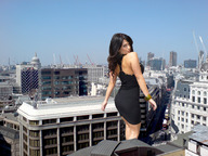 giantess collage city buildings brunette smiling wonderslug london walking streets denise_milani looking_back looking_at_viewer between_buildings rooftop_view