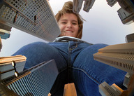 city mega clothed low_angle smiling looking_down skyscraper point_of_view looking_at_viewer joe117