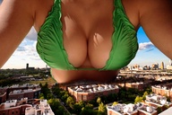 breasts giantess collage city destruction cleavage buildings lying_down unknown_artist bikini_top chest
