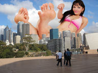 giantess collage city barefoot soles brunette lying_down unknown_artist shrunken_people looking_at_viewer pointing