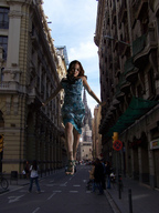 giantess collage feet city high_heels brunette low_angle street shrunken_people looking_down sky looking_at_viewer between_buildings accasbel barcelona erica_christensen