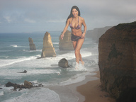 giantess collage small_man beach cleavage ocean brunette smiling wonderslug rocks cliff chasing arianny_celeste navel_ring