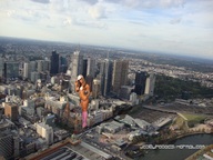 giantess collage city blonde swimsuit buildings shoes leggings skyscraper standing aerial_view looking_at_viewer baseball_cap joselitooo23