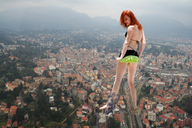 giantess collage city long_hair destruction barefoot red_hair short_skirt outdoors bikini_top