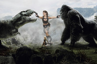 breasts giantess collage mega blonde cleavage brunette gloves ponytail boots shorts jungle king_kong top guns lara_croft rescue tyrannosaurus_rex bare_midriff