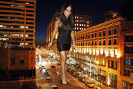 breasts giantess city mega destruction brunette wonderslug celebrity dress looking_down night olivia_munn finger_held little_black_dress kidnapping bare_legs car_crush