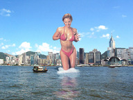 giantess collage city blonde swimsuit cleavage wonderslug short_hair hand skyscraper boats sky looking_at_viewer wading waterfront