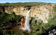 breasts giantess collage mega wet brunette waterfall waterfall_shower looking_at_viewer cliff downward_angle zed782