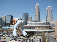 giantess collage city clothed buildings brunette wonderslug bending_over skyscraper parking_lot vehicle_crush