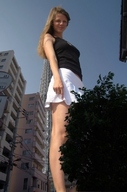 giantess collage clothed skirt low_angle legs sky looking_at_viewer