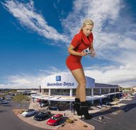 giantess collage blonde high_heels wonderslug dress boots clouds sky jenni_czech car_dealership holding_vehicle