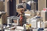 giantess collage city swimsuit buildings belly wave skyscraper standing looking_at_viewer rooftop_view