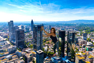 giantess collage city destruction clothed brunette skyscraper aerial_view looking_at_viewer