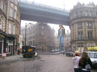 giantess collage city clothed wonderslug walking sunglasses streets vehicles kelly_brook holding_vehicle
