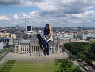 giantess collage city clothed buildings brunette sitting clouds sky looking_at_viewer alla