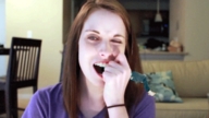 blue_eyes blood brunette animation shrunken_man looking_at_viewer biting_head laina killing ps3_has_no_games
