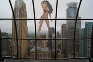 breasts giantess collage city mega long_hair swimsuit destruction cleavage asian wonderslug window skyscraper standing looking_at_viewer lightning natasha_yi
