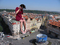 giantess collage feet buildings brunette smiling dress sitting sandals village looking_down people streets pedicure flip_flops mite crowds sitting_on_building downward_angle