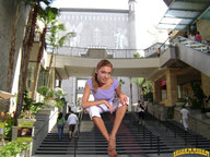 giantess collage blonde clothed barefoot buildings sitting steps pedicure looking_at_viewer lowerrider