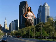 breasts giantess collage city mega black_hair skirt traffic skyscraper vehicles leaning_against_building philadelphia looking_at_viewer hands_on_hips see_through_lingerie zed782