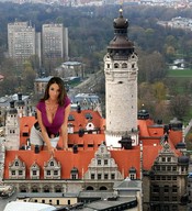 giantess collage city cleavage buildings brunette brown_eyes looking_at_viewer rooftop_view zed782