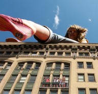 giantess collage city brunette low_angle sitting sandals women under_foot point_of_view looking_at_viewer vehicle_crush pink_sandals on_building