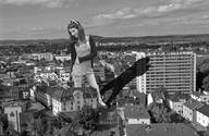 giantess collage city monochrome clothed buildings brunette unknown_artist standing rooftop_view alla