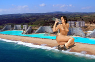 breasts giantess collage nude beach high_heels buildings brunette unknown_artist sitting waves sand aerial_view resort crystal_lagoon san_alfonso_del_mar chile