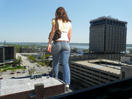 giantess collage city butt clothed buildings brunette wonderslug walking sky vehicle_crush rooftop parking_garage
