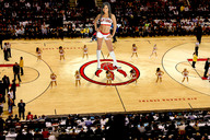 giantess collage brunette wonderslug cheerleader boots looking_at_viewer crowds basketball_court navel_ring