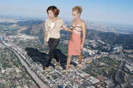 collage city mega blonde destruction clothed brunette wonderslug walking under_foot dust hayden_panettiere eva_longoria