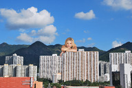 giantess collage city blonde buildings wonderslug short_hair mountains sky looking_at_viewer sarah_chalke behind_building