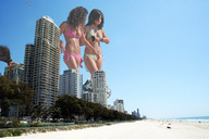 collage mega swimsuit destruction beach ocean buildings helicopter brunette wonderslug walking sand giantesses