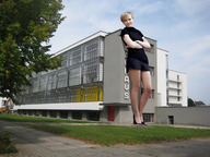 giantess collage blonde high_heels buildings wonderslug dress short_hair leaning sky looking_at_viewer