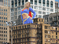 breasts giantess collage city mega blonde skirt low_angle wonderslug supergirl belly looking_down sky cape top looking_at_viewer belt between_buildings dc_comics bare_midriff