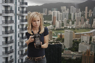 giantess collage city blonde clothed wonderslug camera skyscraper kristen_bell looking_at_tiny