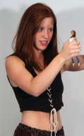collage clothed handheld red_hair belly shrunken_woman fist looking_at_tiny cp31