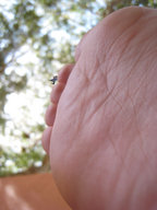 collage micro barefoot soles low_angle unknown_artist shrunken_men falling outdoors point_of_view