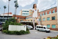 giantess collage cleavage brunette stockings smiling wonderslug nurse standing sky hospital street_view leilani_dowding