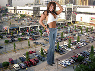 giantess collage city clothed cleavage buildings brunette smiling wonderslug vehicles athletic parking_lot cracked_pavement