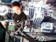 giantess collage city brunette wonderslug latex catsuit looking_at_viewer bianca_beauchamp downward_angle zipper cracked_pavement body_suit