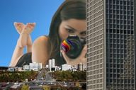 collage city mega barefoot traffic buildings brunette lying_down camera streets vehicles sky hot_air_balloon