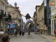 giantess collage city black_hair butt clothed jeans people outdoors sky between_buildings squeezemeflat sidewalk behind_view street_view