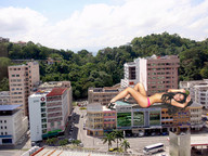 giantess collage city high_heels buildings wonderslug lying_down streets looking_at_viewer olivia_munn