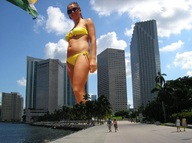 collage city mega swimsuit buildings skyscraper sunglasses sky looking_at_viewer waterfront giulio_10