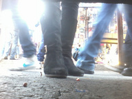 collage micro boots shrunken_men walking shrunken_man streets photograph pavement peque