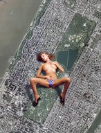 giantess collage city sleeping high_heels red_hair lying_down thong airplane manhattan new_york_city