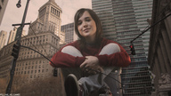 giantess collage city buildings brunette smiling sitting sneakers looking_at_viewer new_york_city ellen_page ps3_has_no_games